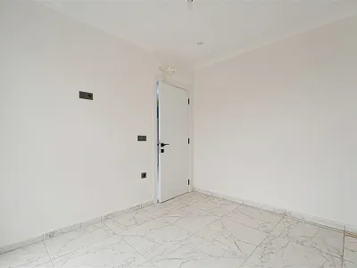 Квартира планировкой 1+1 в новом жилом комплексе в районе Махмутлар